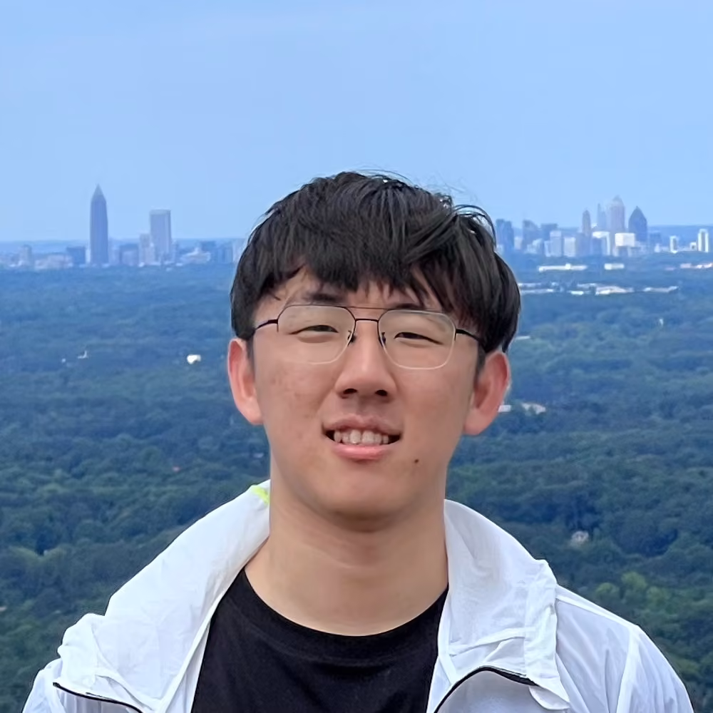 I am Shihefeng. I am wearing a blue shirt.